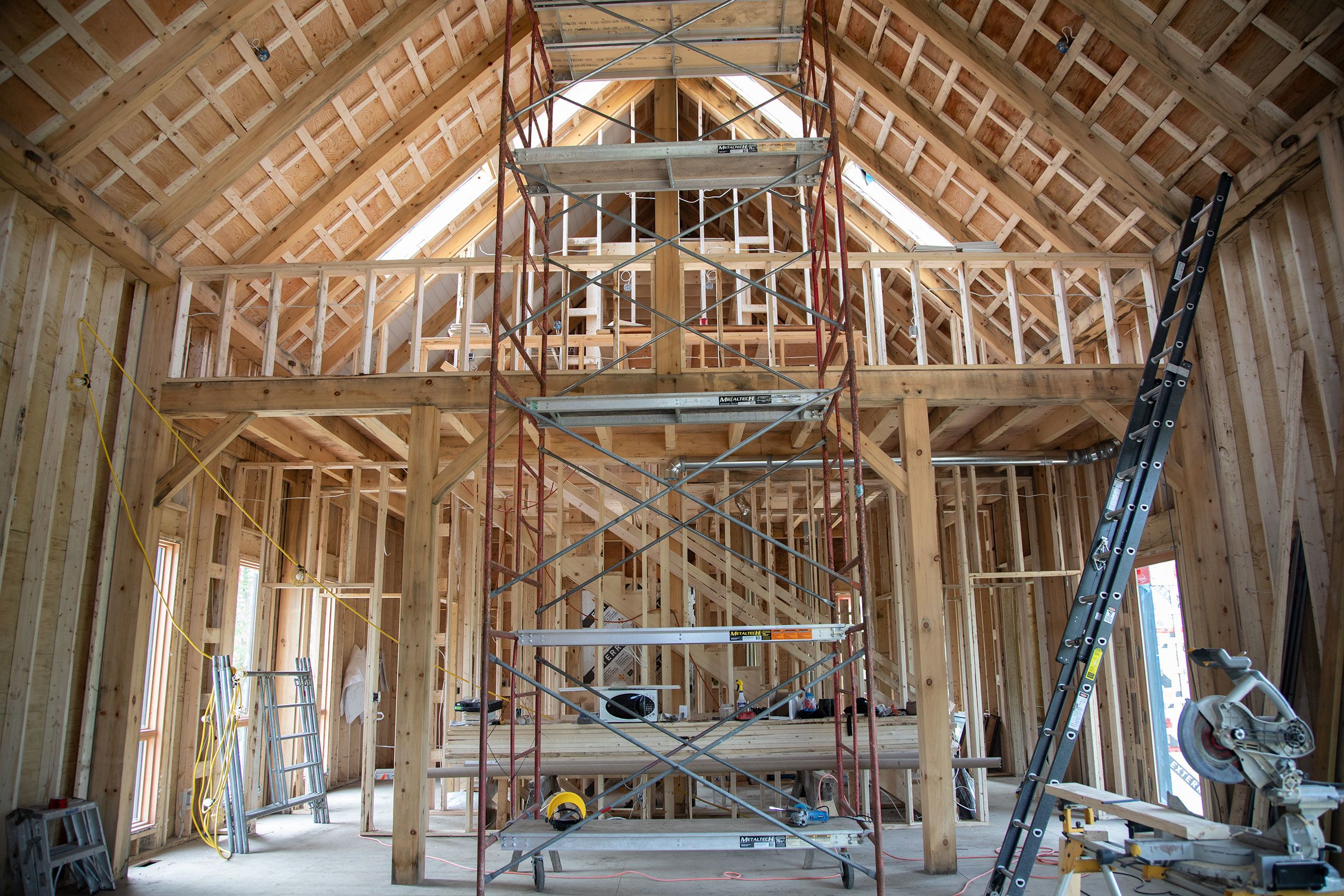 Inside the main house timber frame structure more framing continues to create the loft rooms and balcony walkway